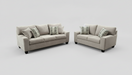 Sofa and Loveseat Set with decorative toss pillows in a furniture store setting