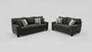 Gray sofa and loveseat set with patterned toss pillows on a light gray background