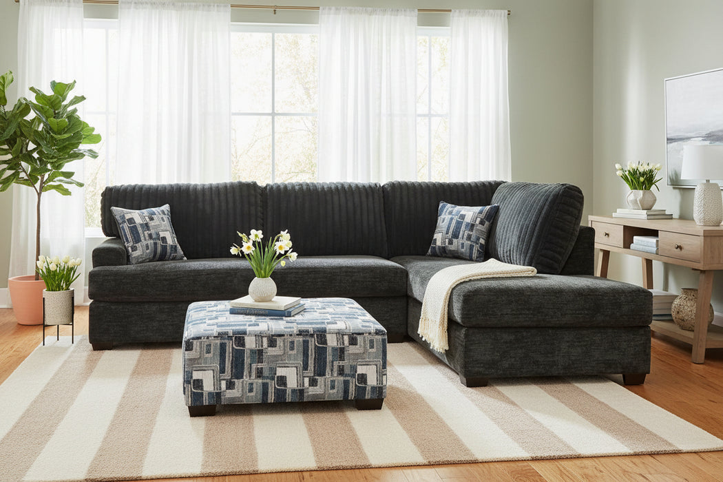 6129 Sectional in Galactic Parchment or Charcoal